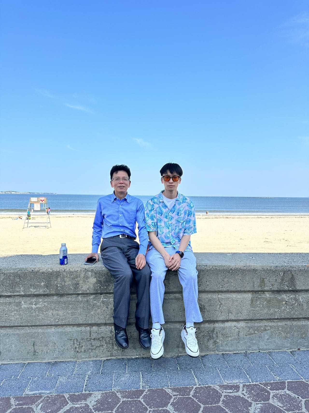 By the water